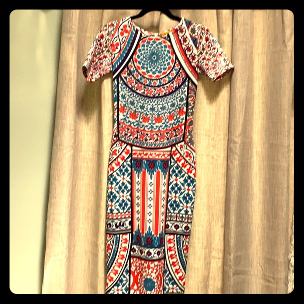 Short sleeve, fitted, print scuba dress. Size xs.